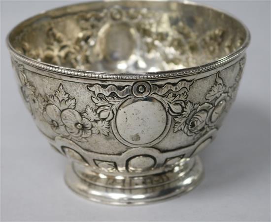 A 19th century Indian Colonial embossed silver sugar bowl by Cooke & Kelvey, Calcutta, 6.5 oz.